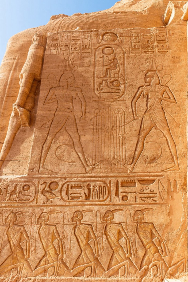 Statue of Ramses II at Abu Simbel at sunrise